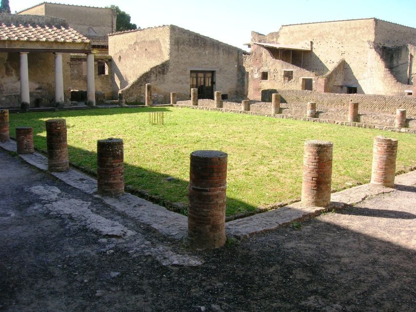 From Naples: 2-Hour Herculaneum Kid-Friendly Tour - Houses that tell stories: Skeletons, Neptune, and the Black Saloon