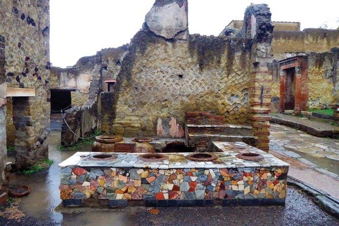 Herculaneum Private Tour with an Expert Archaeologist - The Ancient Beach Stop: Boat Sheds and Skeletons