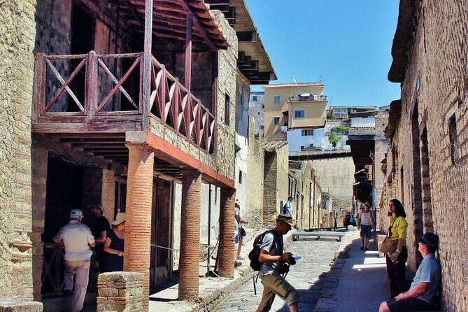 Herculaneum ruins and Naples Center Full Day Private Tour From Rome - Inside Parco Acheologico di Ercolano: frescoes, houses, and what the lava saved
